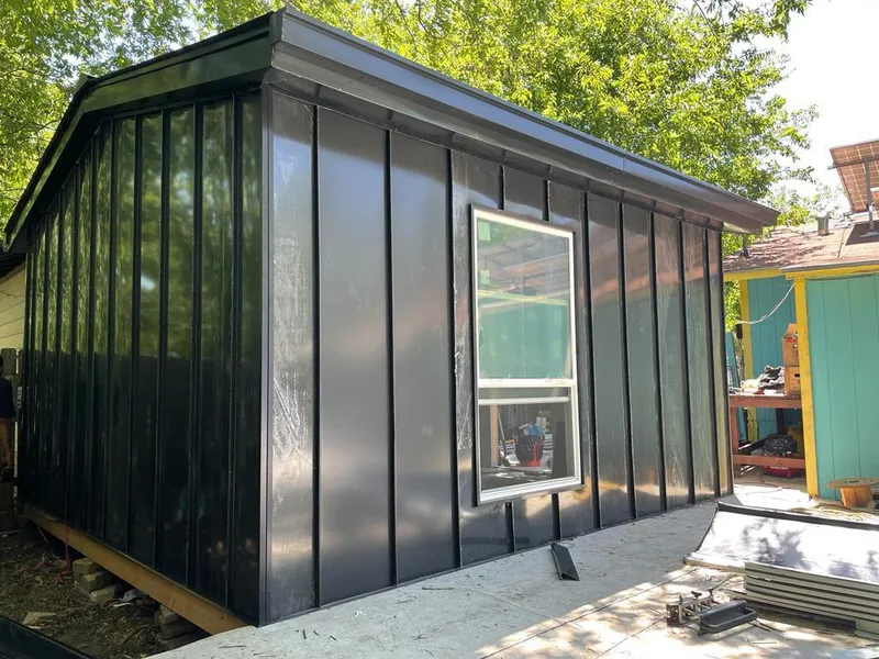 Black standing seam metal wall panels for Roof Inspection in Virginia Beach